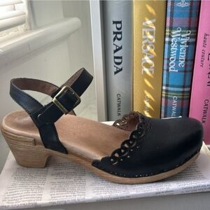 Dansko Black Lace Cutout Clogs